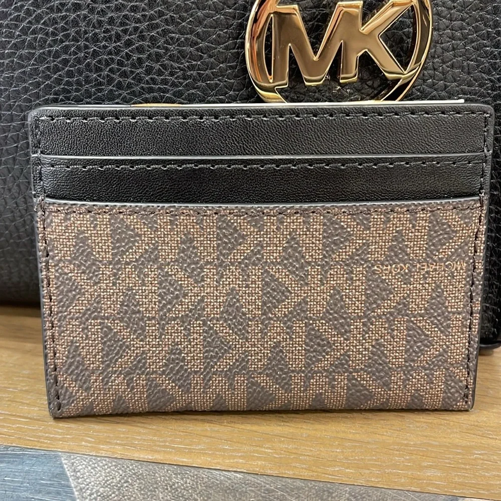 MICHAEL KORS
Reed Large Card Holder Case Wallet 
Brown /Black MK Signature 
NWT - Picture 3 of 16